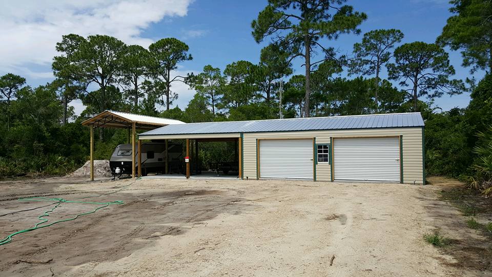 24X36 GARAGE WITH 24X24 CARPORT AND 14X30 RV COVER