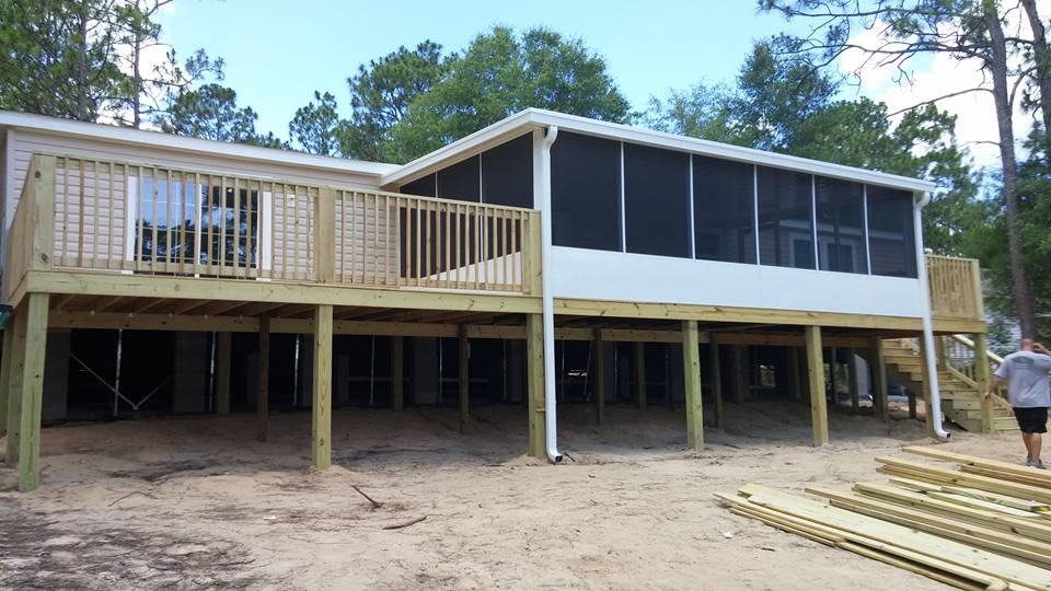 65 FOOT WOOD DECK WITH 24 FOOT SCREEN ROOM