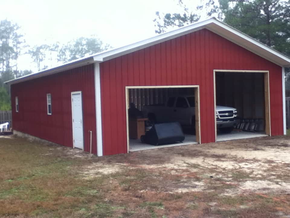 36x48x12 ENCLOSED POLE BARN RED WITH WHITE TRIM