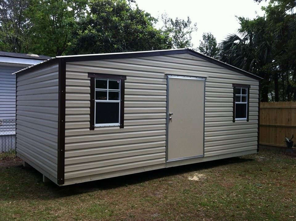 12X16 PORTABLE BUILDING TAN AND BROWN TRIM