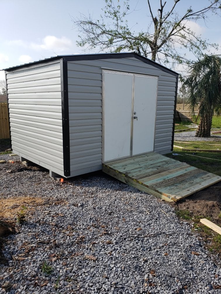 10X12 PORTABLE WITH A 6 FOOT DOOR