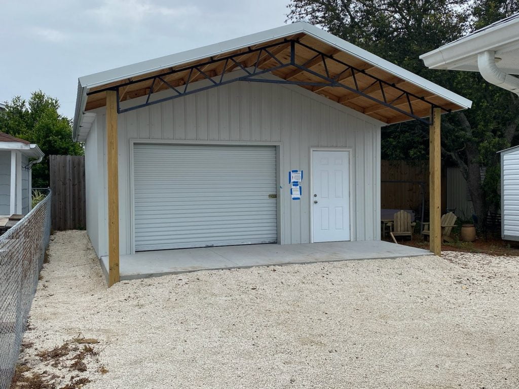 24X24 ENCLOSED POLE BARN WITH 10X7 ROLL DOOR
