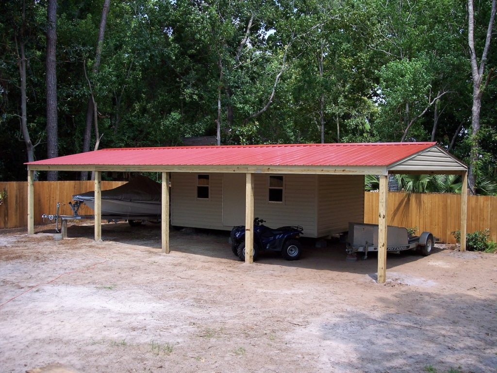 12X20 PORTALBE WITH CARPORTS ON THREE SIDES