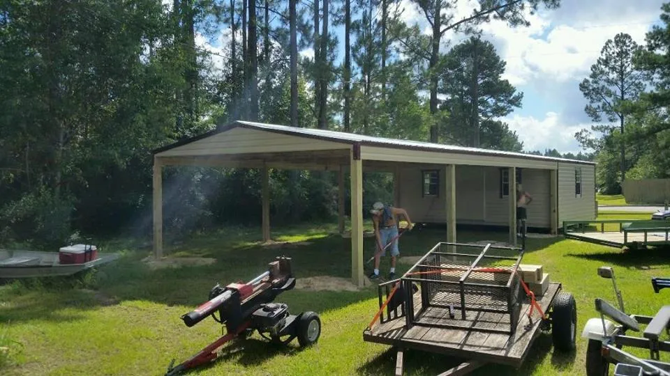 16X20 PORTABLE WITH 20X36 CARPORT