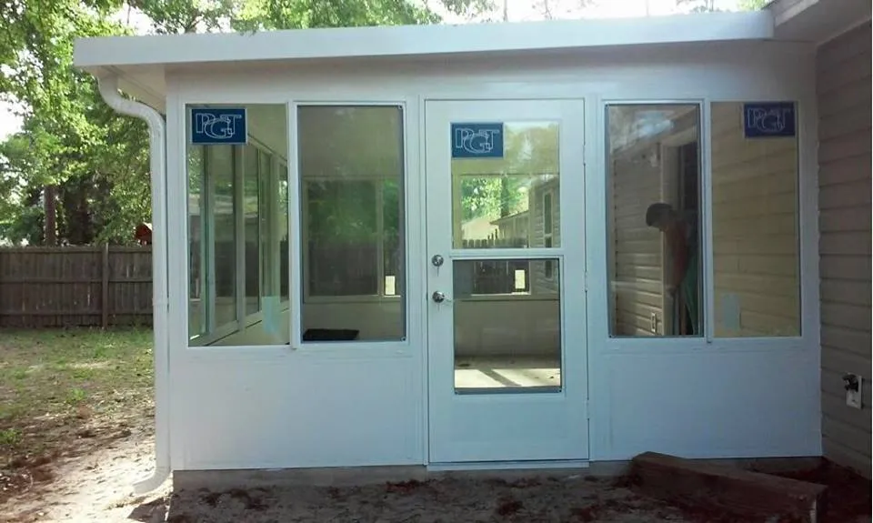 HEATED AND COOLED ATTACHED SUN ROOM
