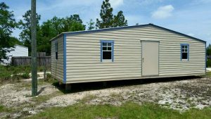 12X32 PORTABLE BUILDING TAN WITH BLUE TRIM