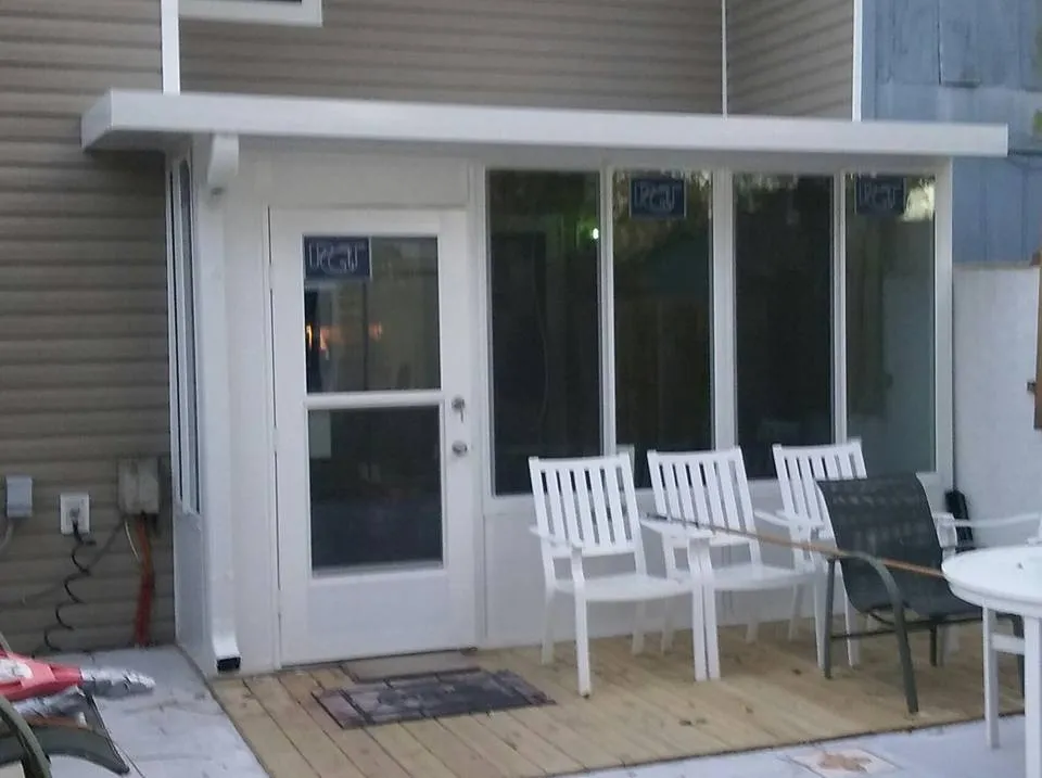 SUN ROOM ON TOWN HOUSE