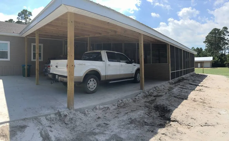 ATTACHED CARPORT WITH CONCRETE