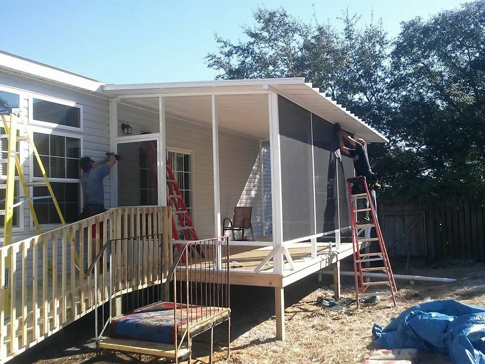 SCREEN ROOM ON WOOD DECK WITH RAMP