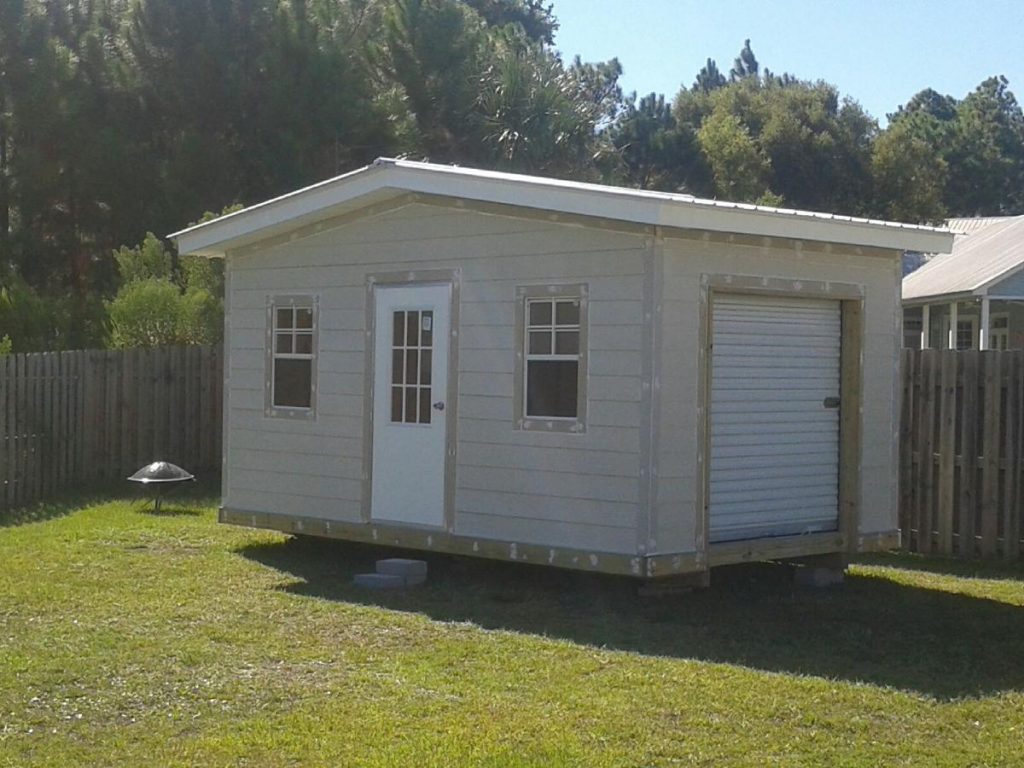 12X16 HARDY BOARD SHED WITH ROLL UP DOOR