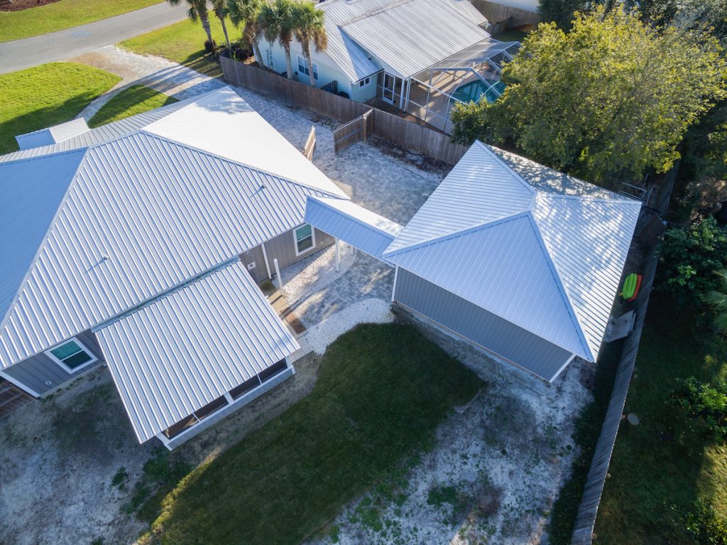 AERIAL VIEW OF SCREEN ROOM AND GARAGE WE BUILT WITH ATTACHED WALK WAY