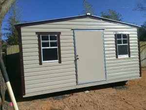 12X16 PORTABLE TAN WITH BROWN TRIM