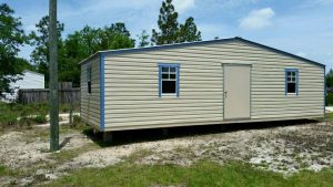 12X32 PORTABLE BUILDING TAN WITH BLUE TRIM