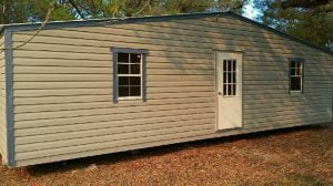 12X32 PORTABLE BUILDING TAN WITH GREEN TRIM