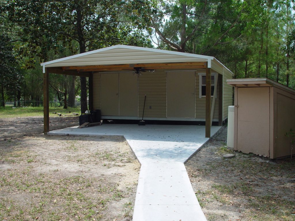 BUILIDING CARPORT COMBO WITH CONCRETE SLAB AND WALKWAY