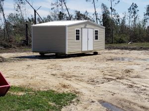 12X20 PORTABLE BUILDING WITH A DOUBLE DOOR TAN AND WHITE