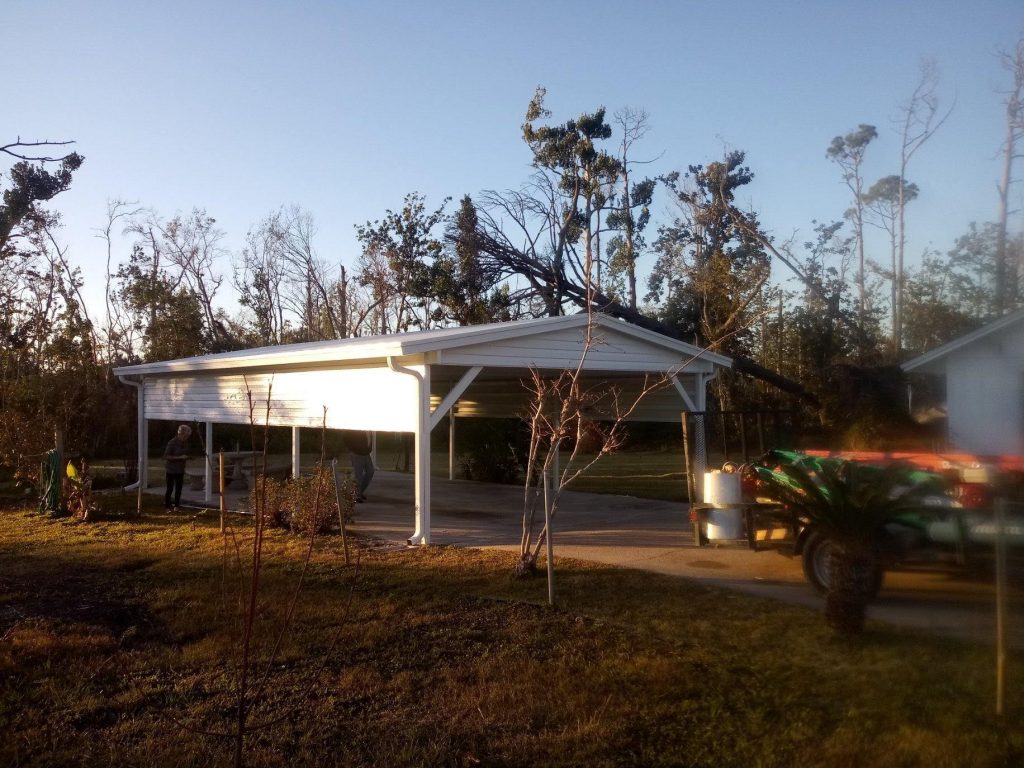 24X36 CARPORT WITH 4 FOOT SIDES