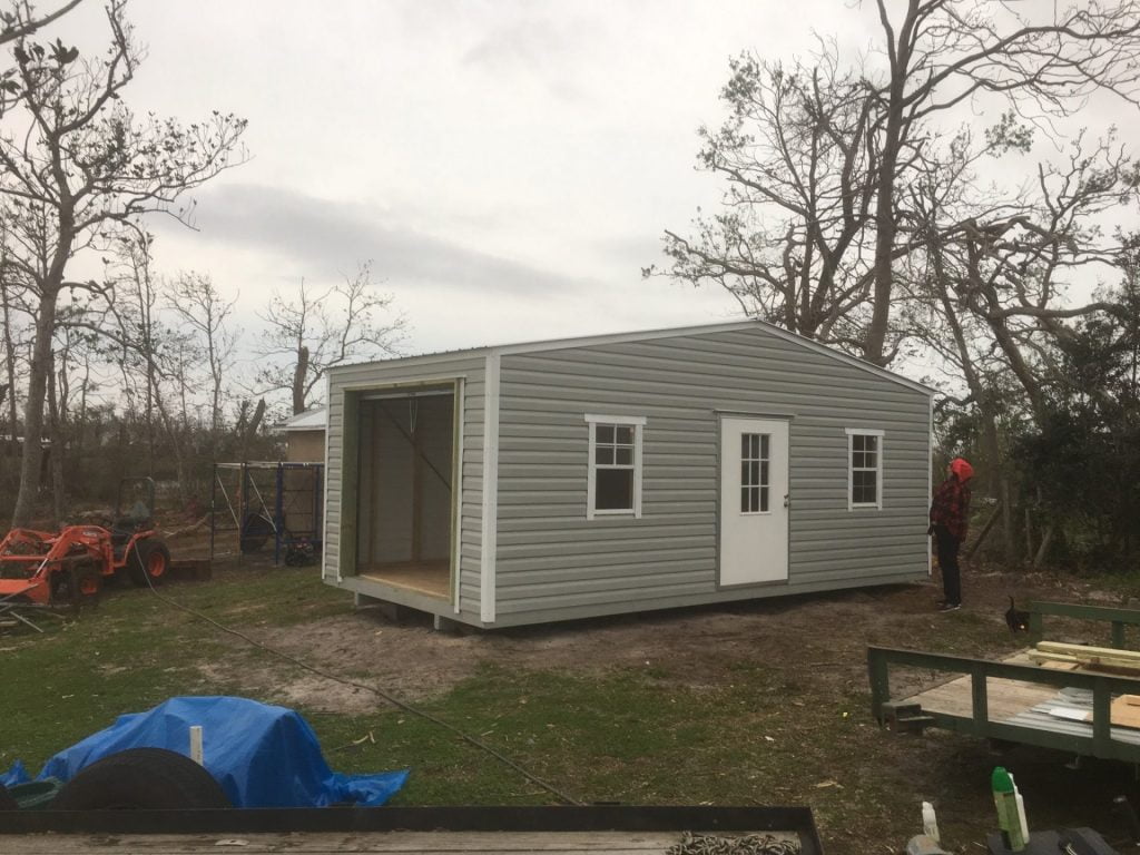 12X24 PORTABLE BUILDING WITH ROLL UP DOOR
