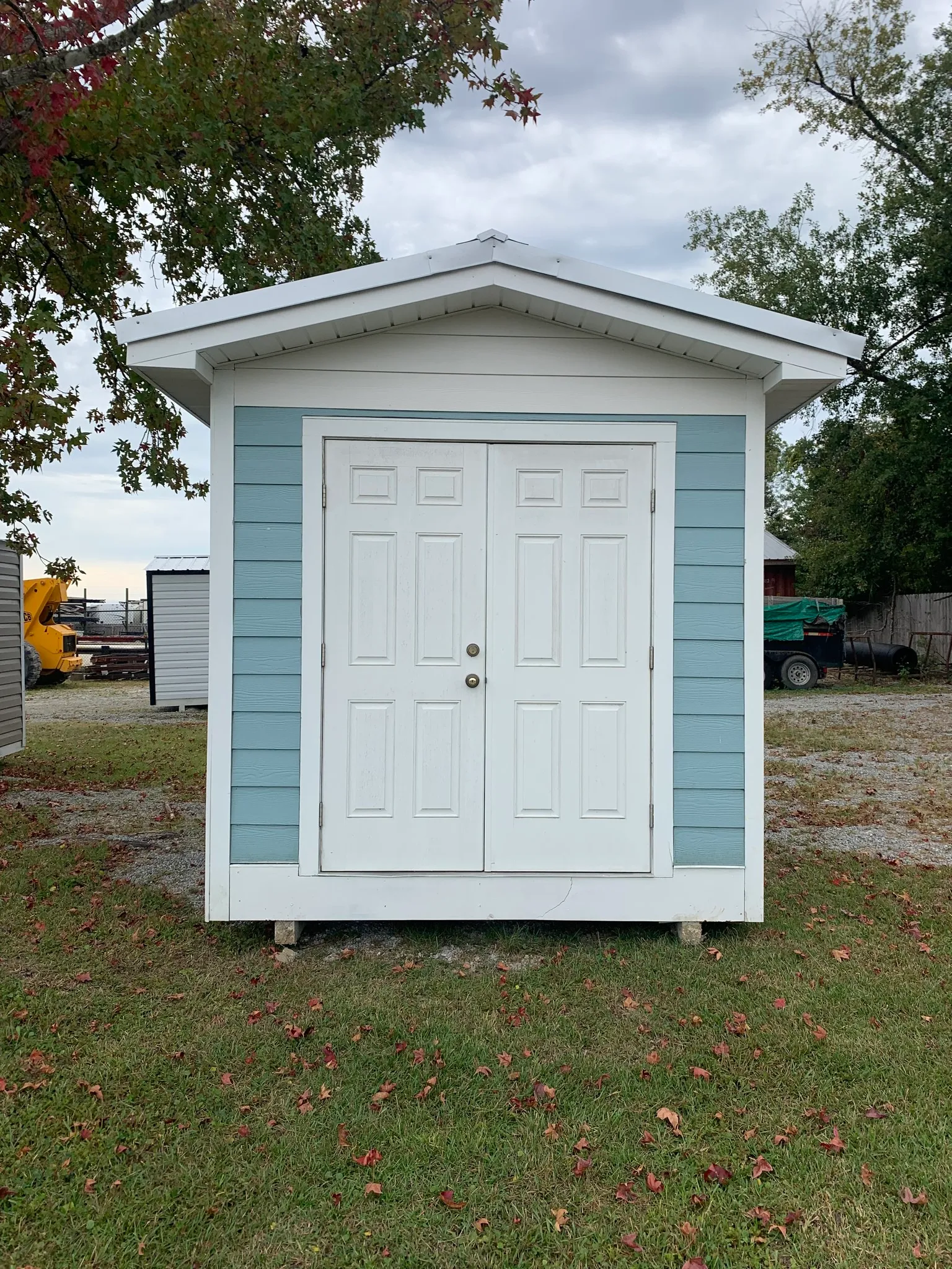 10X16 FIBER BOARD SHED WITH OVERHANG