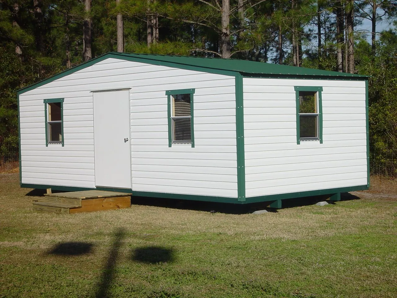 12X24 PORTABLE BUILDING WHITE WITH GREEN ROOF