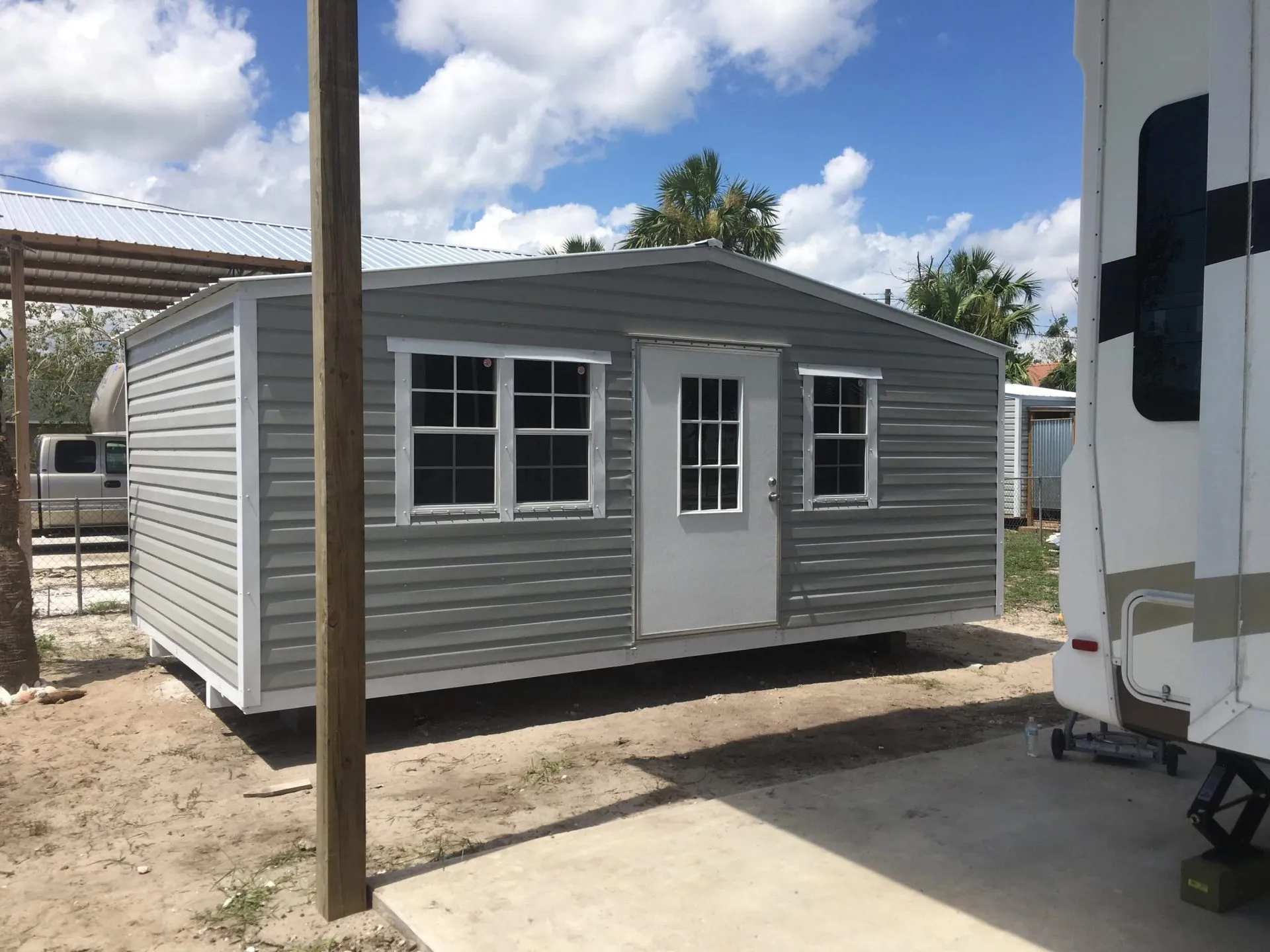 12X20 PORTABLE BUILDING 9 LIGHT DOOR