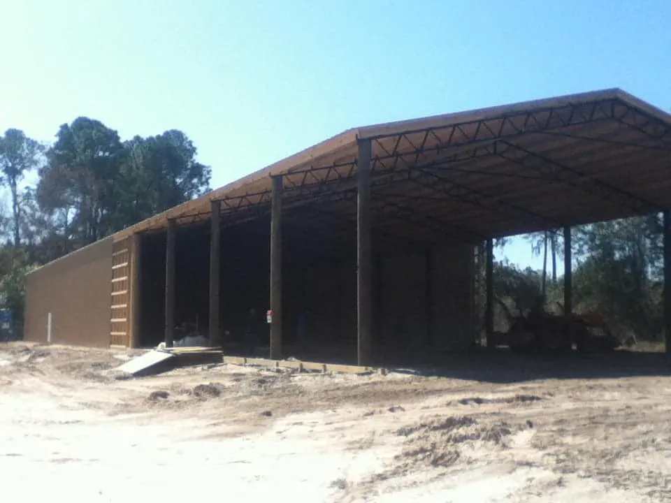 ENCLOSED POLE BARN UNDER CONSTRUCTION