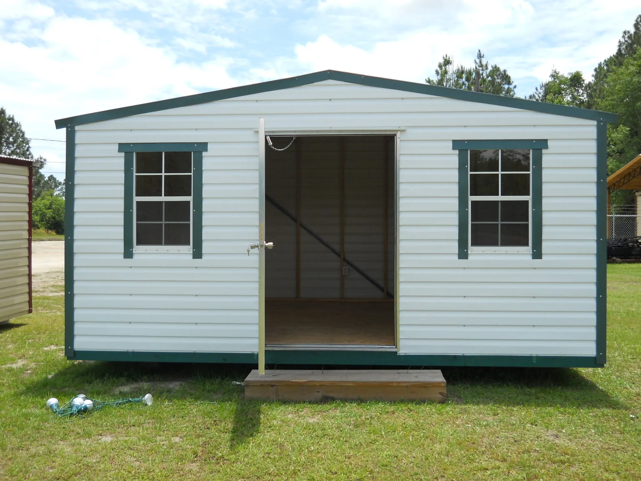 12x16 PORTABLE WHITE WITH GREEN TRIM